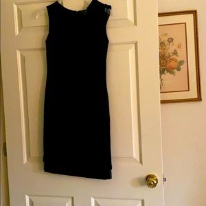 Black dress with leather on side an bottom